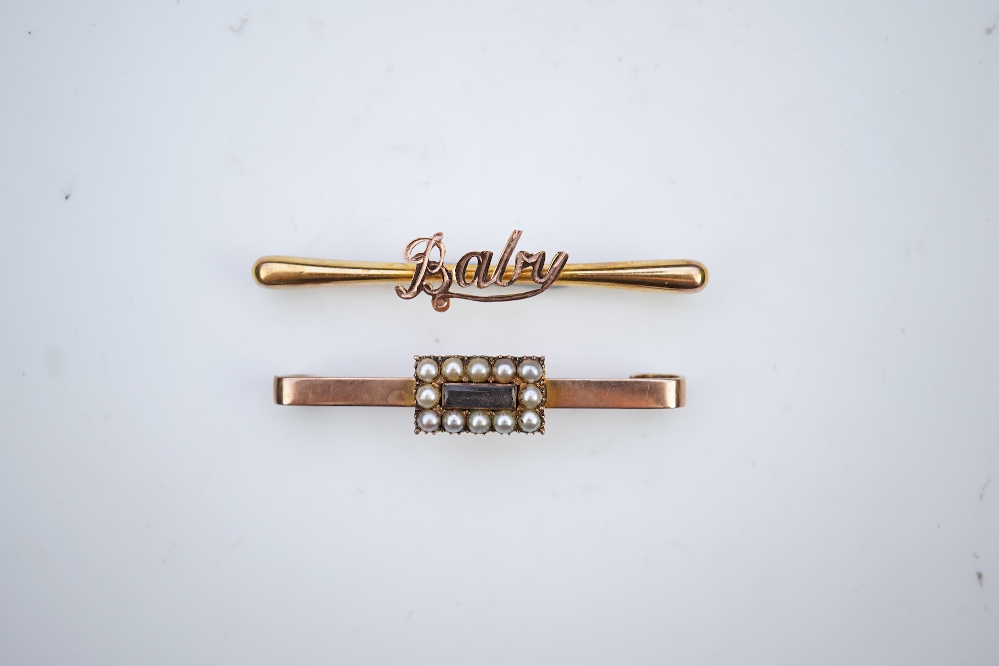 Two bar brooches